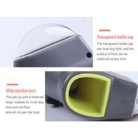 Image showing features of the Everyday Essentials™ Pet Treat Launcher, including a transparent bottle cap and wide ejection port.