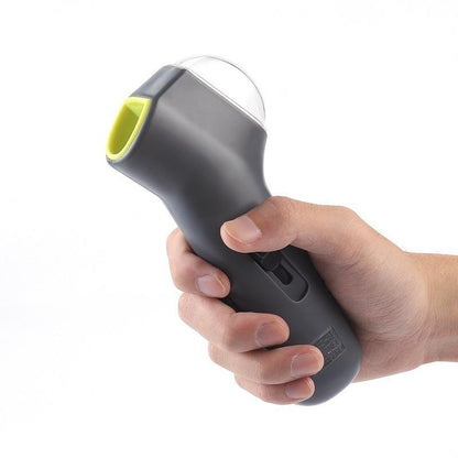 Everyday Essentials™ Pet Treat Launcher held in hand, designed for fun dog treat dispensing.